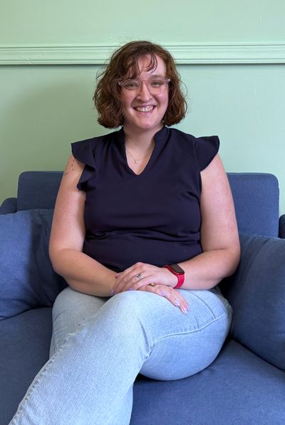 Tori sitting in a chair